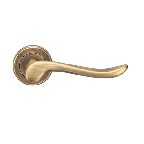 Revive Lighting Revive Dove Curved Lever Door Handles - Antique Brass 1 Revive Lighting Revive Dove Curved Lever Door Handles - Antique Brass